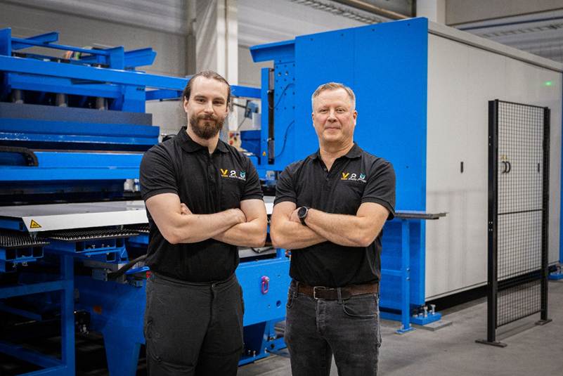 Joni Grönholm and Mika Virtanen at Pivatic’s facility, standing in front of the completed line ready to be delivered to the customer.